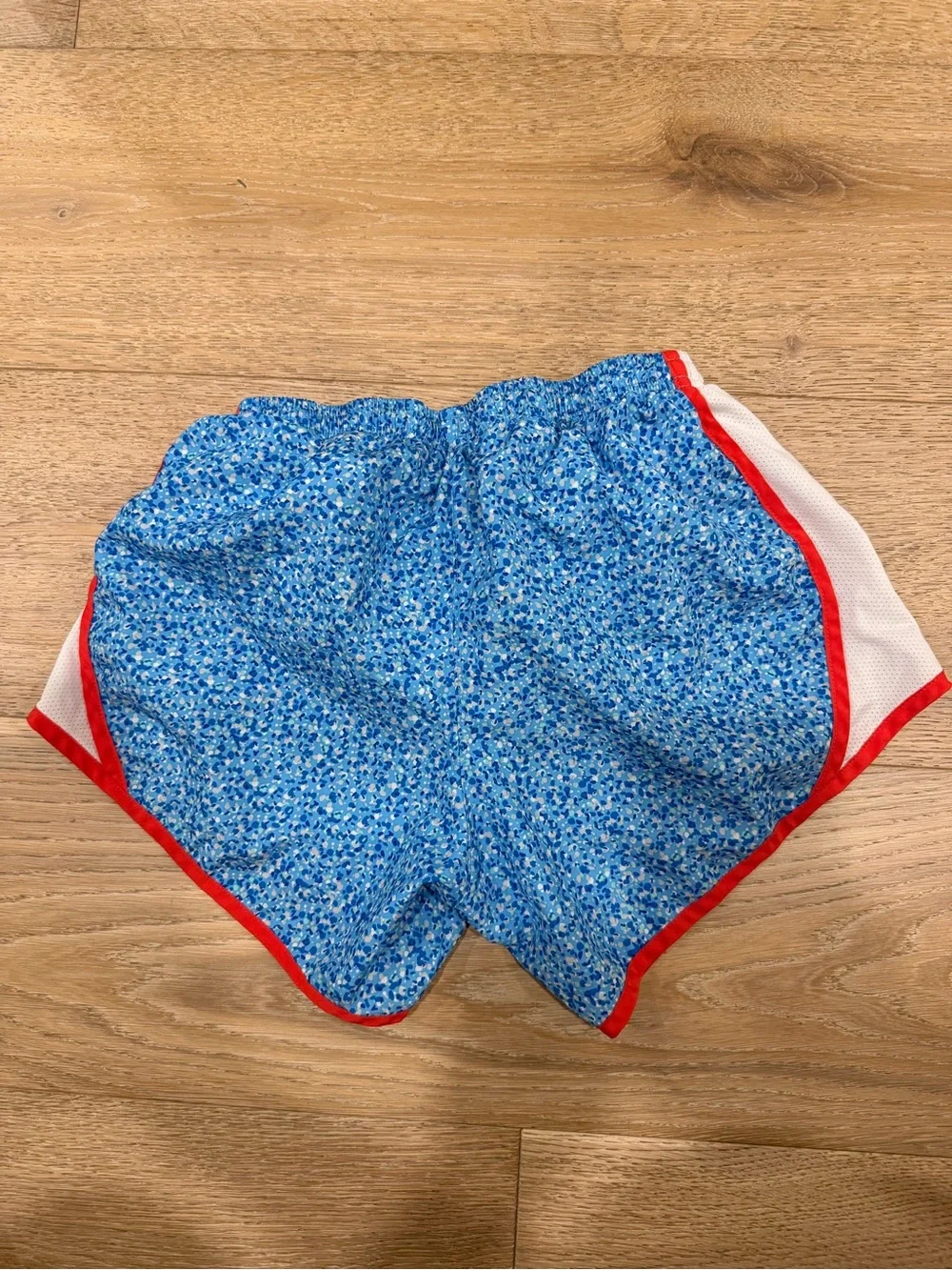 Girls Nike Blue Floral Print Athletic Shorts with Red Trim
